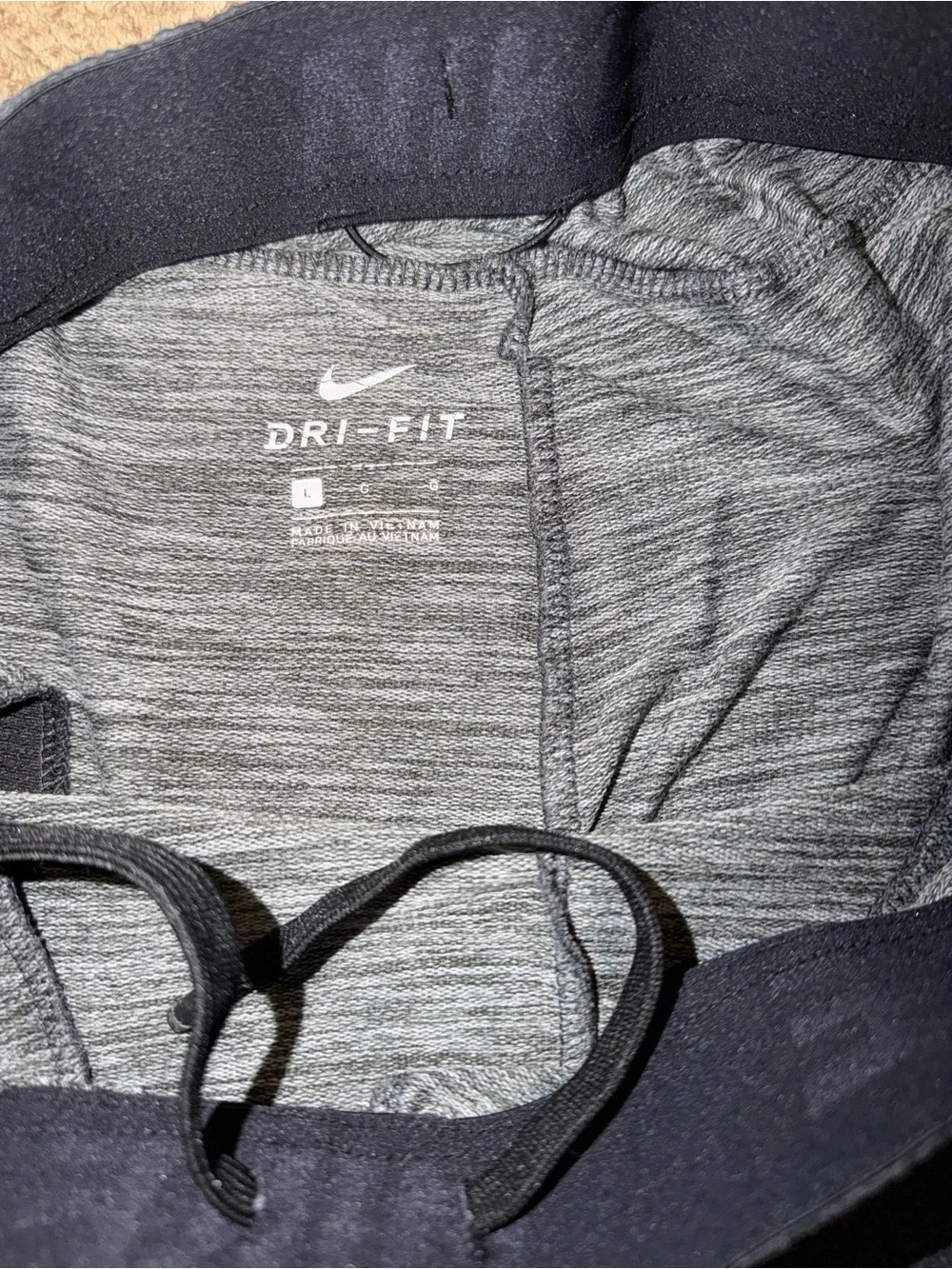 Nike Dri-Fit Men’s Heathered Charcoal Gray Athletic Shorts with Silver Swoosh